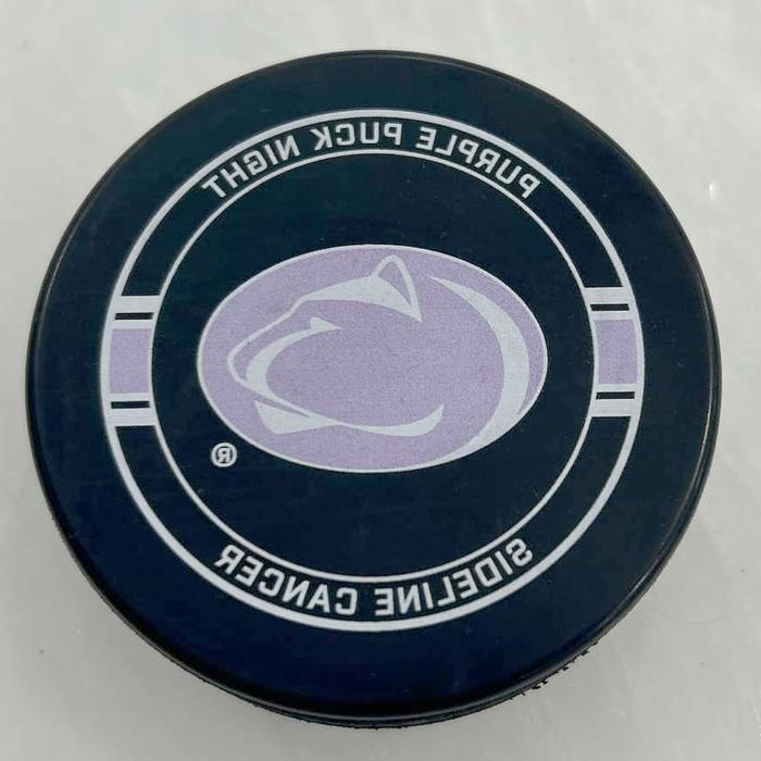 The Purple Puck event’s commemorative game puck.